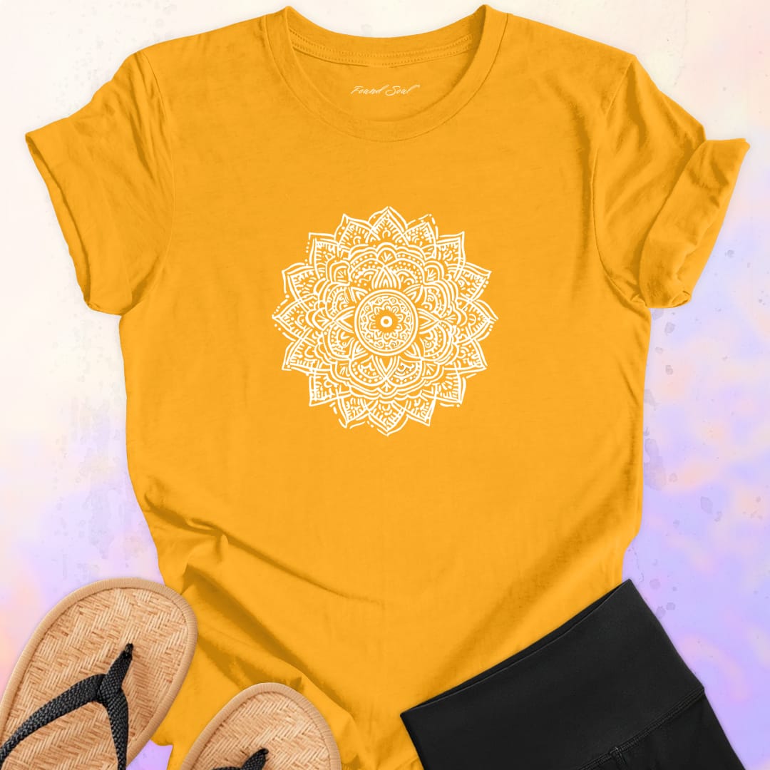 Mandala with delicate petal symmetry on yellow t-shirt for meditation consciousness expansion sacred geometry