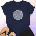 Mandala with delicate petal symmetry on navy t-shirt for meditation consciousness expansion sacred geometry