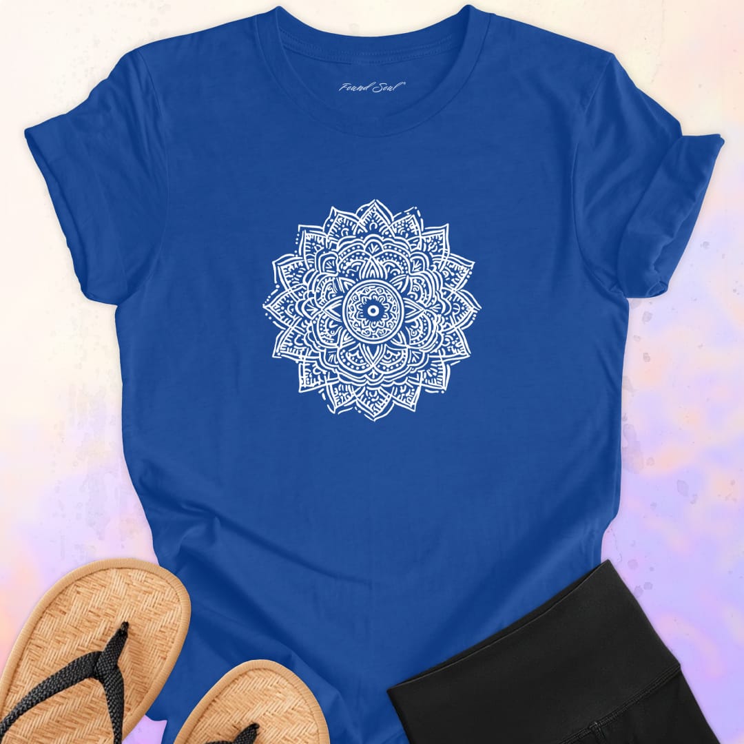 Mandala with delicate petal symmetry on blue t-shirt for meditation consciousness expansion sacred geometry