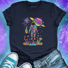 Astronaut in vibrant rainbow garden with Saturn planet above on nay t-shirt for cosmic nature mysticism.