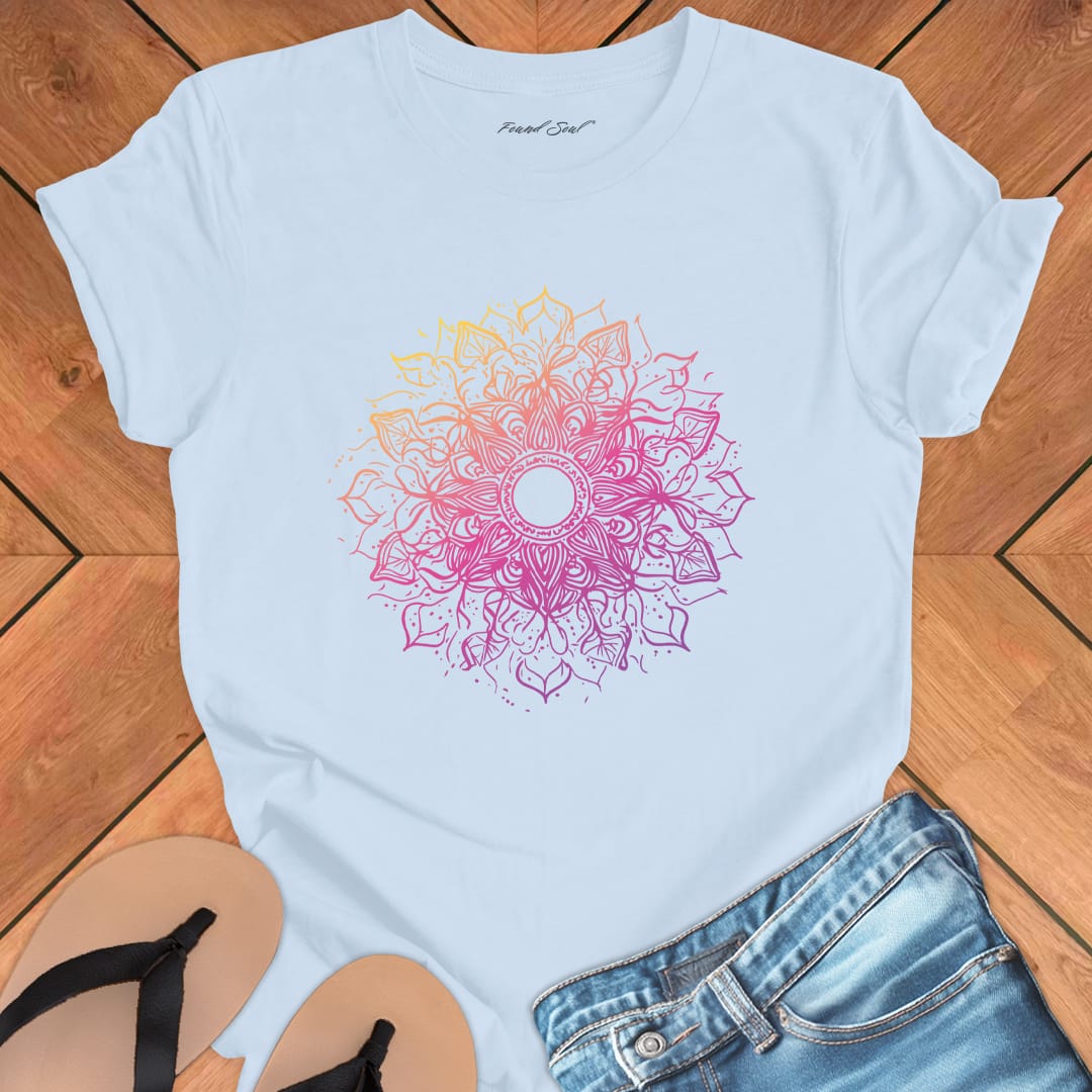 Cosmic mandala starburst radiating galactic energy on light blue t-shirt for solstice cosmic geometry sacred pattern