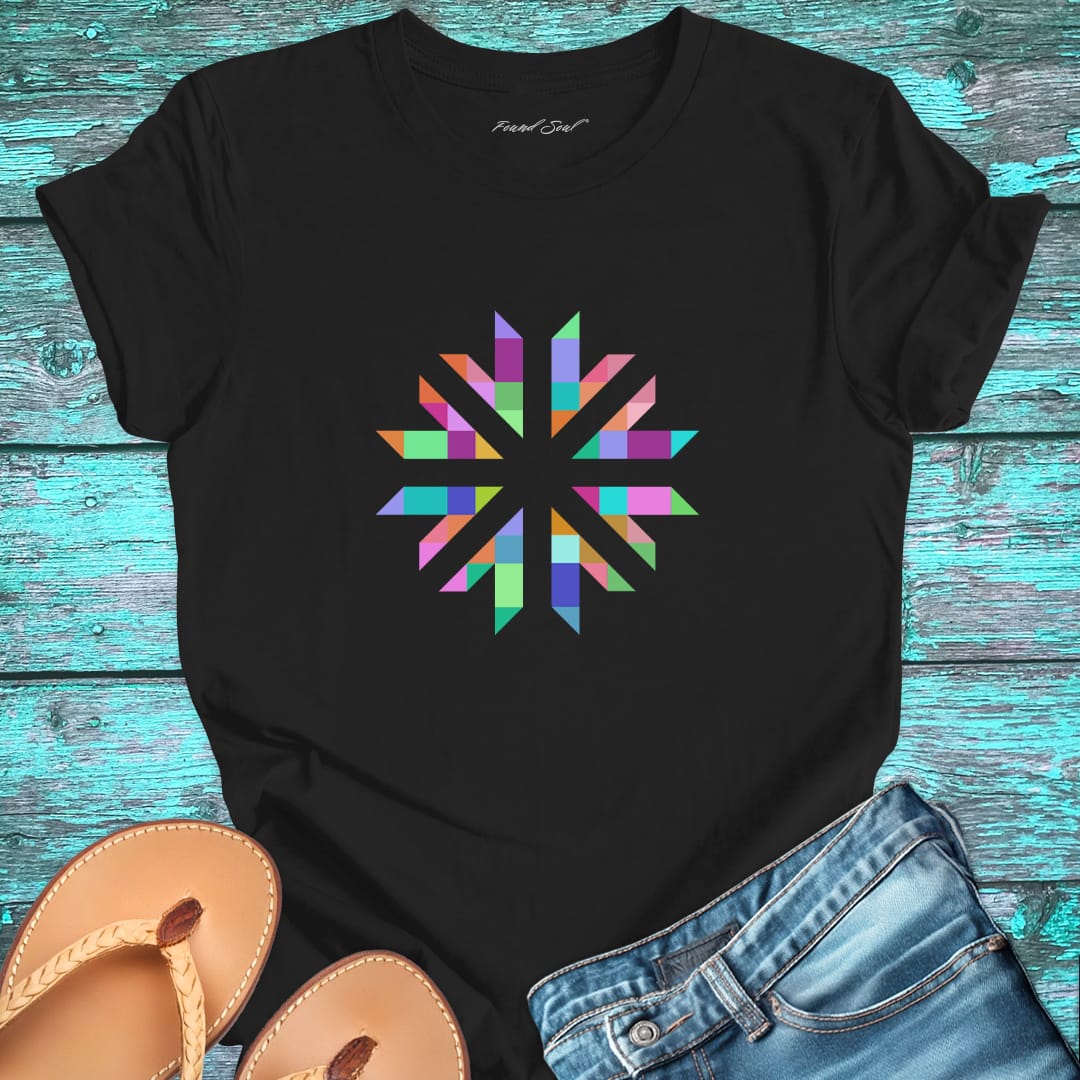 Vibrant geometric starburst radiating on black t-shirt for color frequency sacred geometry visual harmony