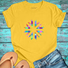 Vibrant geometric starburst radiating on yellow t-shirt for color frequency sacred geometry visual harmony