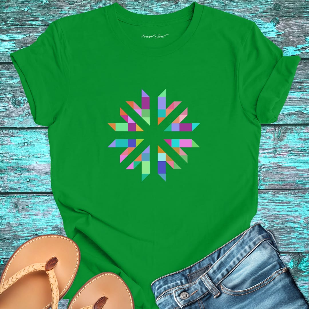 Vibrant geometric starburst radiating on green t-shirt for color frequency sacred geometry visual harmony