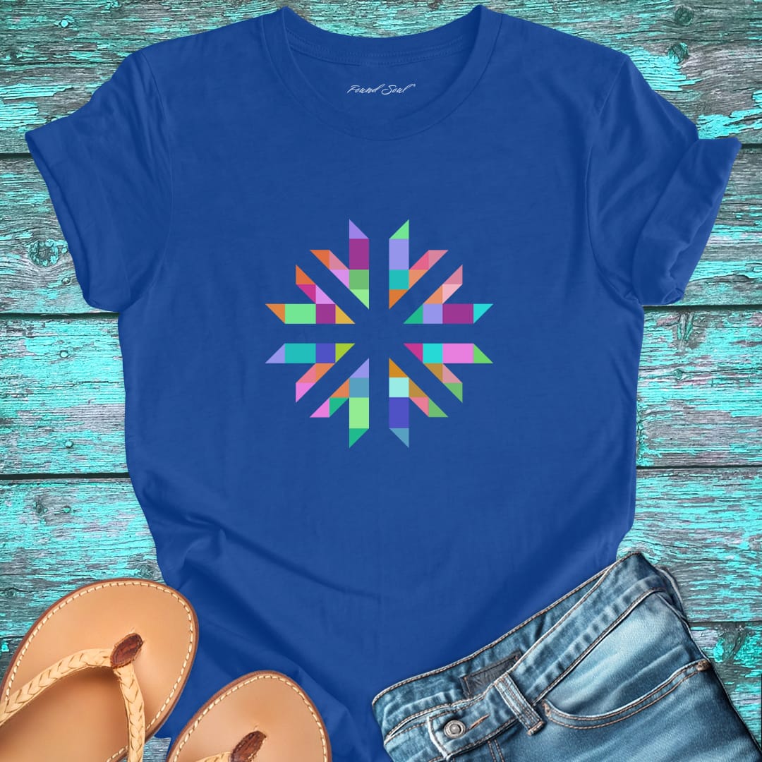 Vibrant geometric starburst radiating on blue t-shirt for color frequency sacred geometry visual harmony