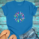 Vibrant geometric starburst radiating on blue t-shirt for color frequency sacred geometry visual harmony