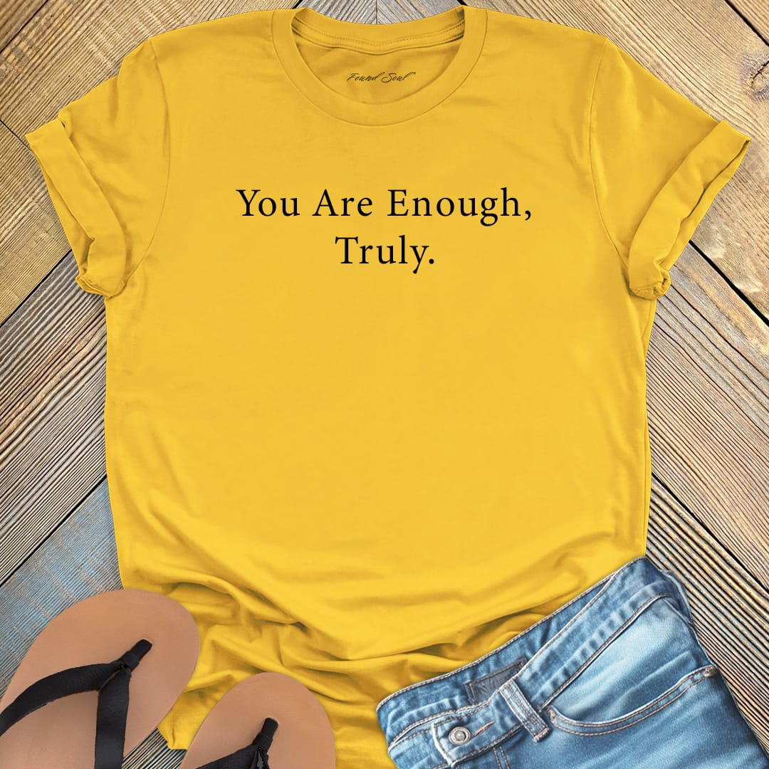 You are enough truly yellow t-shirt, a symbol of self-love and worthiness affirmation apparel.