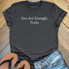 You are enough truly dark grey t-shirt, a symbol of self-love and worthiness affirmation apparel.