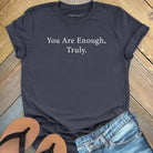 You are enough truly grey t-shirt, a symbol of self-love and worthiness affirmation apparel.