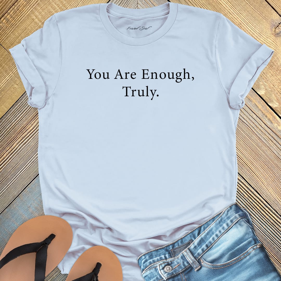 You are enough truly light blue t-shirt, a symbol of self-love and worthiness affirmation apparel.