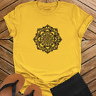 Intricate mandala with delicate line work on yellow t-shirt for zen meditation stillness sacred geometry detail awareness