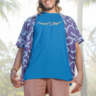 Man wearing Found Soul® rainbow stars blue t-shirt for stardust and cosmic inheritance.